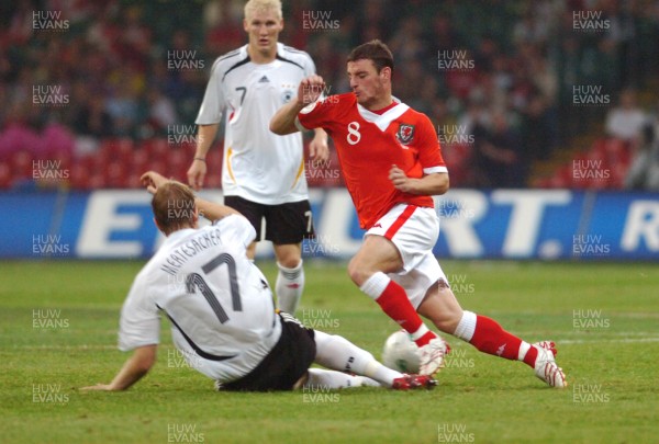 08.09.07 - Euro 2008 Qualifying, Group D Wales v Gemany Wales' Jason Koumas is tackled by Per Mertesacker 