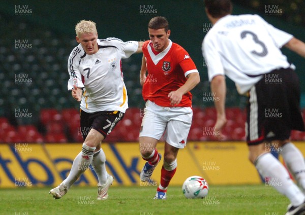 08.09.07 - Euro 2008 Qualifying, Group D Wales v Gemany Wales' Jason Koumas is challenged by Germany's Bastian Schweinsteiger 