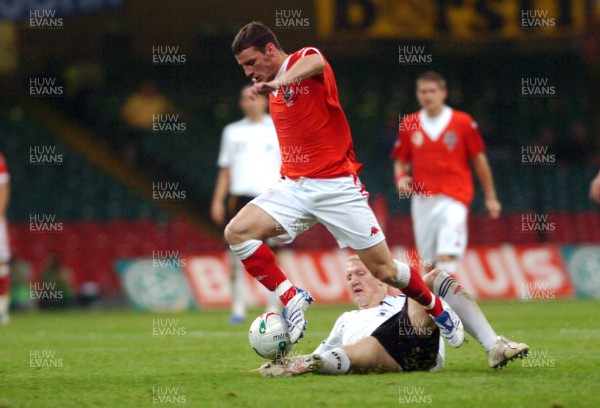 08.09.07 - Euro 2008 Qualifying, Group D Wales v Gemany Wales' Jason Koumas is challenged by Germany's Bastian Schweinsteiger 