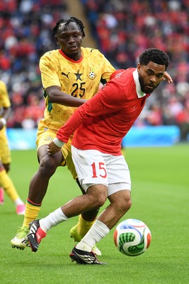 020626 - Wales v Ghana - International Friendly - Jay Dasilva of Wales is challenged by Prince Kwabena Adu of Ghana