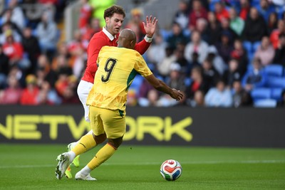 020626 - Wales v Ghana - International Friendly - Jordan Ayew of Ghana goes close after a mistake from Joe Rodon of Wales but is saved by Karl Darlow of Wales