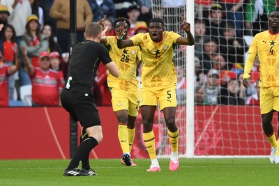 020626 - Wales v Ghana - International Friendly - Thomas Partey of Ghana appeals to the referee after committing a foul