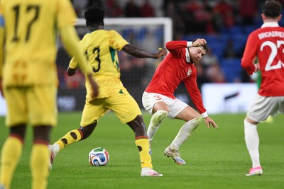 020626 - Wales v Ghana - International Friendly - Neco Williams of Wales is challenged by Christopher Bonsu Baah of Ghana