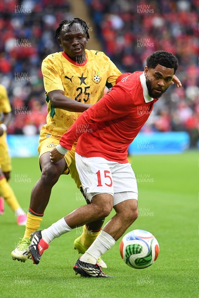 020626 - Wales v Ghana - International Friendly - Jay Dasilva of Wales is challenged by Prince Kwabena Adu of Ghana