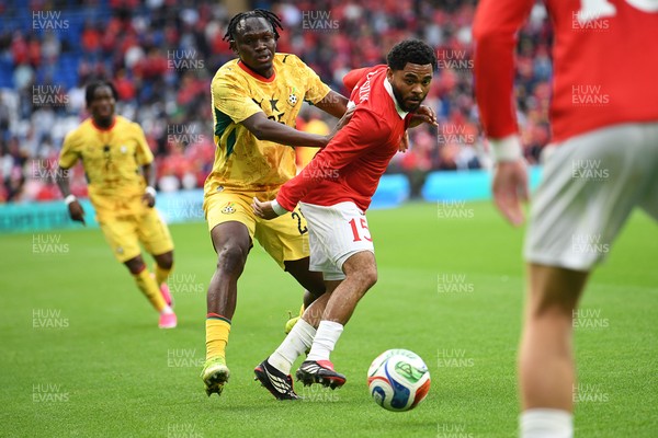 020626 - Wales v Ghana - International Friendly - Jay Dasilva of Wales is challenged by Prince Kwabena Adu of Ghana