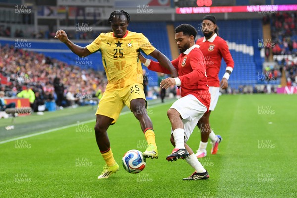 020626 - Wales v Ghana - International Friendly - Prince Kwabena Adu of Ghana is challenged by Jay Dasilva go Wales