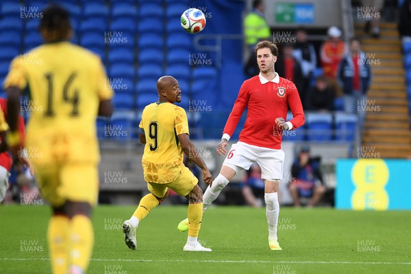 020626 - Wales v Ghana - International Friendly - Joe Rodon of Wales is challenged by Jordan Ayew of Ghana