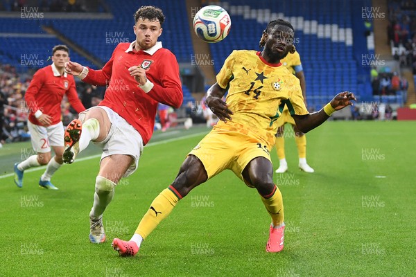020626 - Wales v Ghana - International Friendly - Neco Williams of Wales is challenged by Gideon Mensah of Ghana