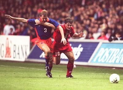 051096 - Wales v Holland - Mark Hughes of Wales and Stan Valckx battle for the ball