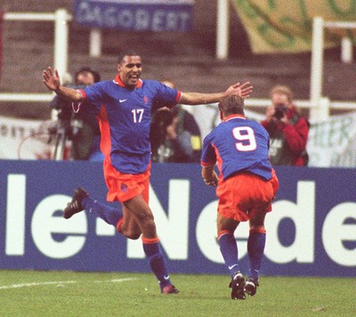 051096 - Wales v Holland - Pierre Van Hooijdonk of Holland celebrates one of his goals