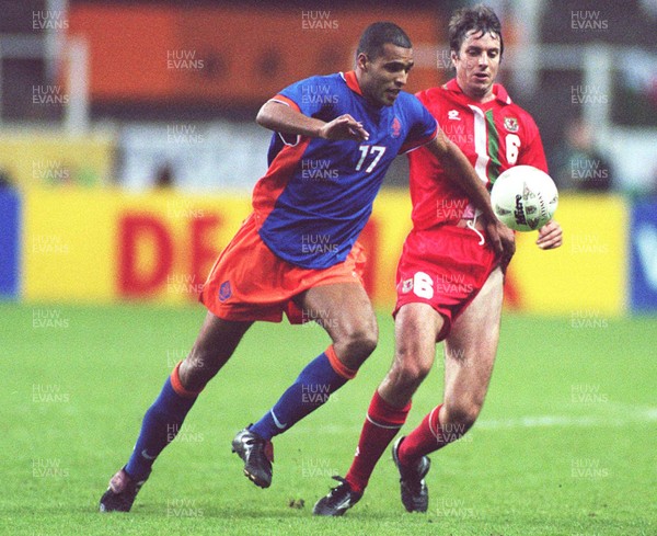 051096 - Wales v Holland - Kit Symons of Wales loses out to Pierre Van Hooijdonk