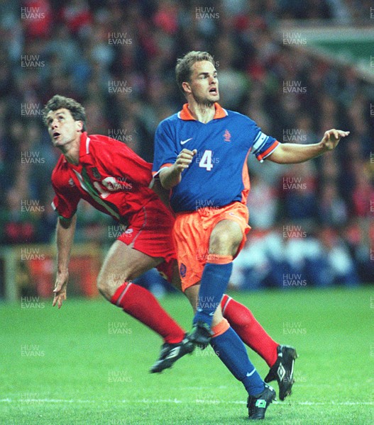 051096 - Wales v Holland - Mark Hughes of Wales and Frank de Boer of Holland