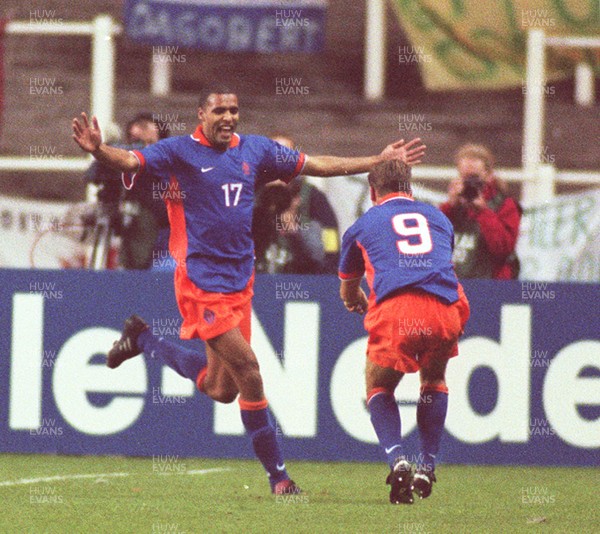 051096 - Wales v Holland - Pierre Van Hooijdonk of Holland celebrates one of his goals