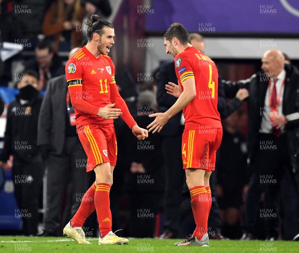 191119 - Wales v Hungary - UEFA Euro Championship Qualifying - Gareth Bale and Ben Davies of Wales celebrate at the end of the game
