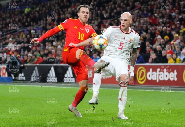 191119 - Wales v Hungary, European Cup 2020 Qualifier - Aaron Ramsey of Wales and Botond Barath of Hungary compete for the ball