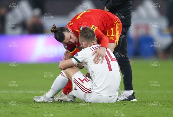 191119 - Wales v Hungary, European Cup 2020 Qualifier - Gareth Bale of Wales consoles Gergo Lovrencsics of Hungary at the end of the match