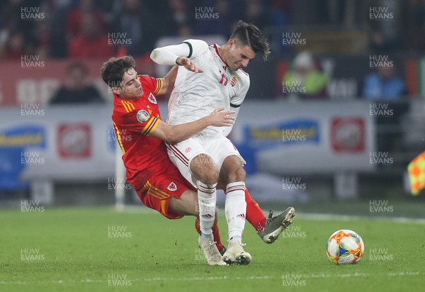 191119 - Wales v Hungary, European Cup 2020 Qualifier - Daniel James of Wales tangles with Dominik Szoboszlai of Hungary as they compete for the ball