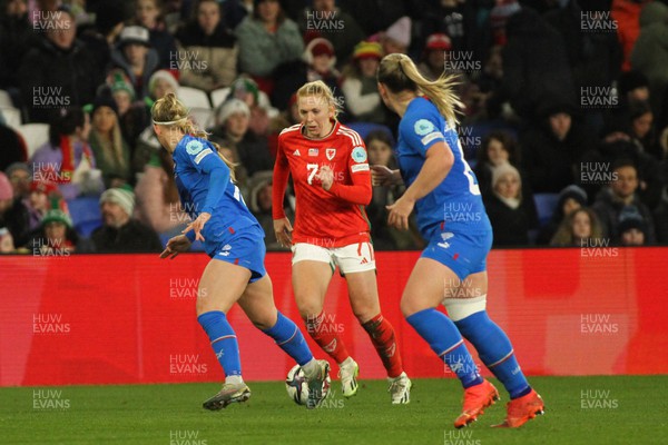 011223 - Wales v Iceland - UEFA Women’s Nations League - Ceri Holland of Wales takes on Saedis Heioarsdottir of Iceland