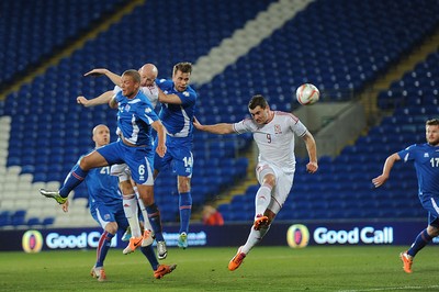 050314 - Wales v Iceland - Friendly -James Collins of Wales heads to score goal