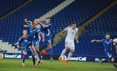 050314 - Wales v Iceland - Friendly -James Collins of Wales heads to score goal