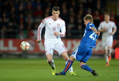 050314 - Wales v Iceland - Friendly -Gareth Bale of Wales and Emil Hallfredsson of Iceland compete