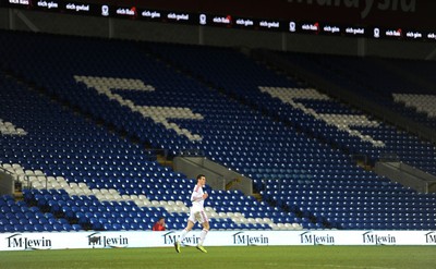 050314 - Wales v Iceland - Friendly -Gareth Bale of Wales looks on in front of rows of empty seats