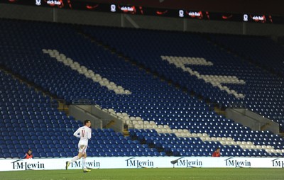 050314 - Wales v Iceland - Friendly -Gareth Bale of Wales looks on in front of rows of empty seats