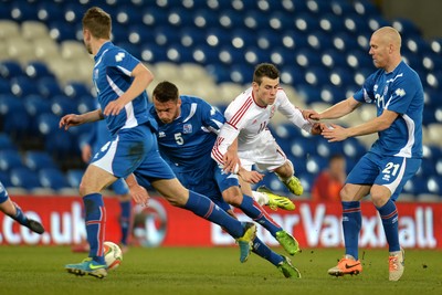 050314 - Wales v Iceland - Friendly -Gareth Bale of Wales collides with Solvi Geir Ottesen Jonsson of Iceland