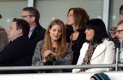 050314 - Wales v Iceland - Friendly -Fiancee of Wales Manager Chris Coleman, Charlotte Jackson checks her watch to see how long is left