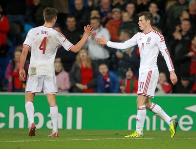 050314 - Wales v Iceland - Vauxhall International Friendly - Emyr Huws and Gareth Bale of Wales 