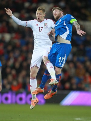 050314 - Wales v Iceland - Vauxhall International Friendly - Jack Collison of Wales and Aron Einar Gunnarsson of Iceland go up for the ball