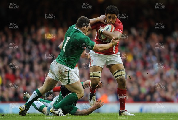 020213 - Wales v Ireland - RBS Six Nations -Toby Faletau of Wales is tackled by Cian Healy and Sean O'Brien of Ireland