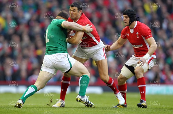 020213 - Wales v Ireland, 2013 RBS 6 Nations - Wales' Mike Phillips is held by Ireland's Cian Healy