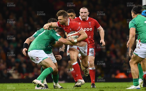 040223 - Wales v Ireland - Guinness Six Nations - Dan Biggar of Wales is tackled by Johnny Sexton of Ireland