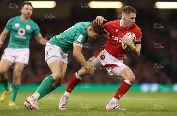 040223 - Wales v Ireland - Guinness Six Nations Championship - Liam Williams of Wales is tackled by Garry Ringrose of Ireland