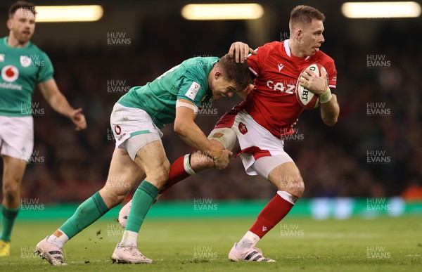 040223 - Wales v Ireland - Guinness Six Nations Championship - Liam Williams of Wales is tackled by Garry Ringrose of Ireland