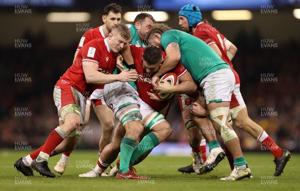 040223 - Wales v Ireland - Guinness Six Nations Championship - Gareth Thomas of Wales is tackled by Tadhg Beirne and Finlay Bealham of Ireland