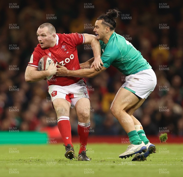 040223 - Wales v Ireland, Guinness Six Nations 2023 - Ken Owens of Wales is held by James Lowe of Ireland