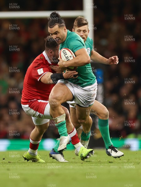 040223 - Wales v Ireland, Guinness Six Nations 2023 - James Lowe of Ireland is tackled by Scott Baldwin of Wales