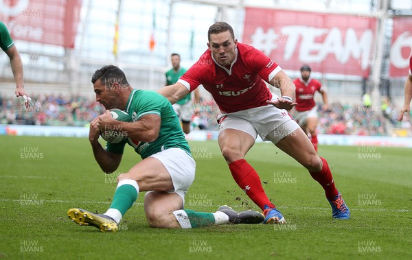 070919 - Wales v Ireland - Guinness Series 2019 - RWC Warm Up - Rob Kearney of Ireland snatches the ball away from George North of Wales