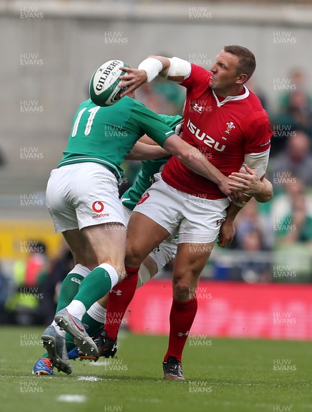 070919 - Wales v Ireland - Guinness Series 2019 - RWC Warm Up - Hadleigh Parkes of Wales is tackled by Robbie Henshaw and Keith Earls of Ireland