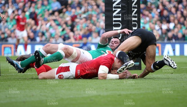 070919 - Wales v Ireland - Guinness Series 2019 - RWC Warm Up - Hadleigh Parkes of Wales scores a try whilst colliding with the referee Mathieu Raynal