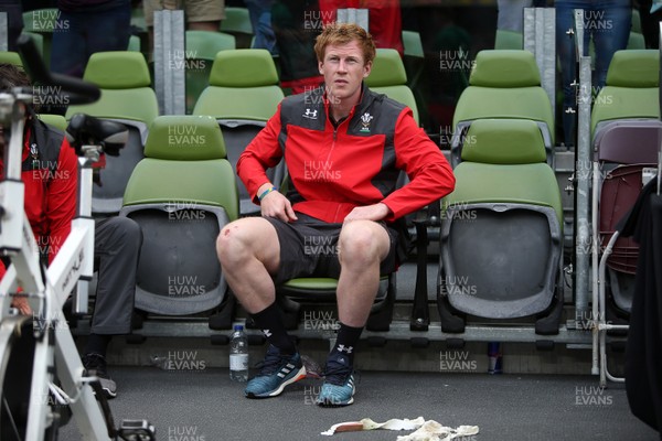 070919 - Wales v Ireland - Guinness Series 2019 - RWC Warm Up - Rhys Patchell of Wales sits on the bench at full time