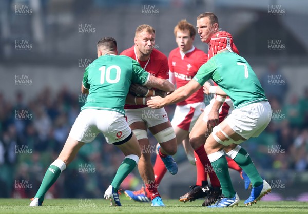070919 - Ireland v Wales - International Rugby Union - Ross Moriarty of Wales is tackled by Jonathan Sexton and Josh van der Flier of Ireland