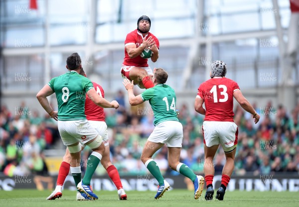 070919 - Ireland v Wales - International Rugby Union - Leigh Halfpenny of Wales is taken out in the air by Jordan Larmour of Ireland