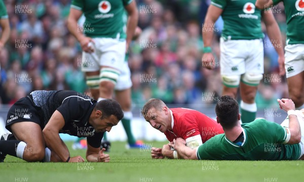 070919 - Ireland v Wales - International Rugby Union - Hadleigh Parkes of Wales collides with Referee Mathieu Raynal as he scores try