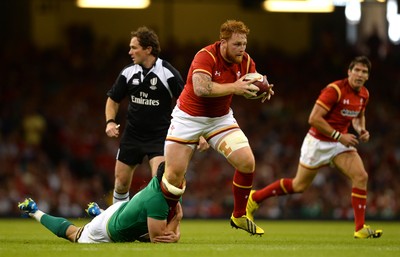 080815 - Wales v Ireland - Dove Men Series 2015 -Dan Baker of Wales is tackled by Tommy O'Donnell of Ireland