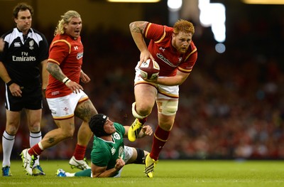 080815 - Wales v Ireland - Dove Men Series 2015 -Dan Baker of Wales is tackled by Tommy O'Donnell of Ireland