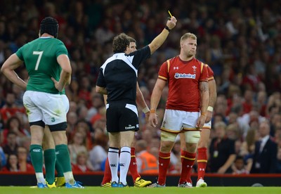 080815 - Wales v Ireland - Dove Men Series 2015 -Referee Glen Jackson shows Ross Moriarty of Wales a yellow card