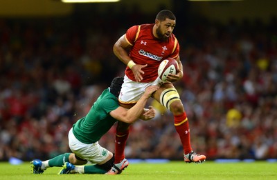 080815 - Wales v Ireland - Dove Men Series 2015 -Taulupe Faletau of Wales is tackled by Tommy O'Donnell of Ireland